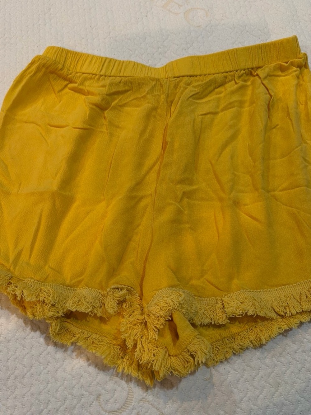 Women's Yellow Fringe Hem Shorts